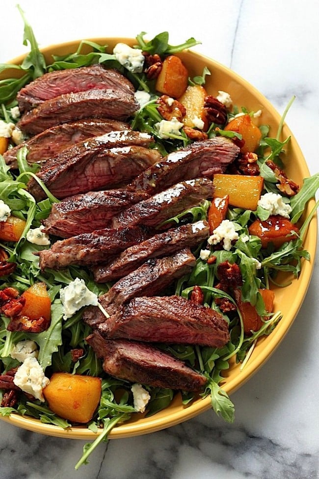 Arugula Skirt Steak Salad with Caramelized Pears Pecans and Gorgonzola