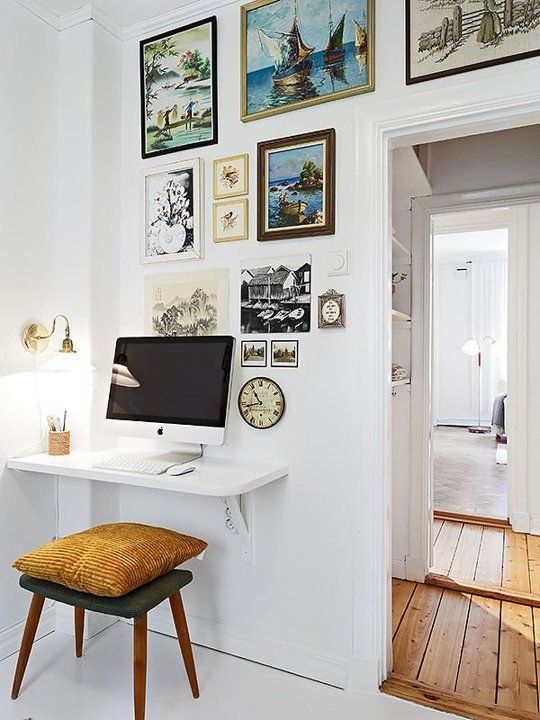 Use a floating shelf to save space for a small home office