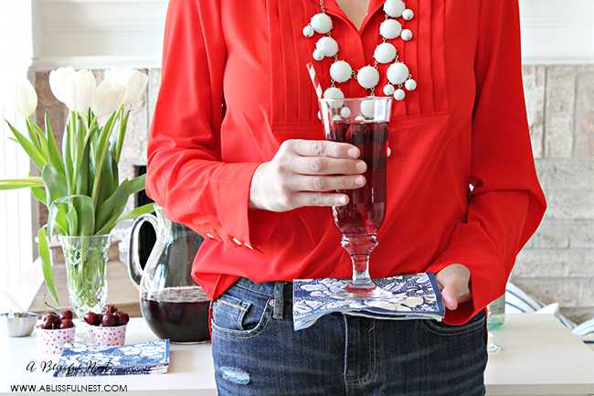 This delicious and refreshing cocktail recipe packs a punch! Full cherry sangria cocktail recipe details at ablisfulnest.com