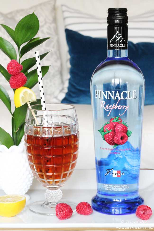 A delicious iced tea that packs a punch! See more on https://ablisfulnest.com/ #cocktailrecipe #cocktails