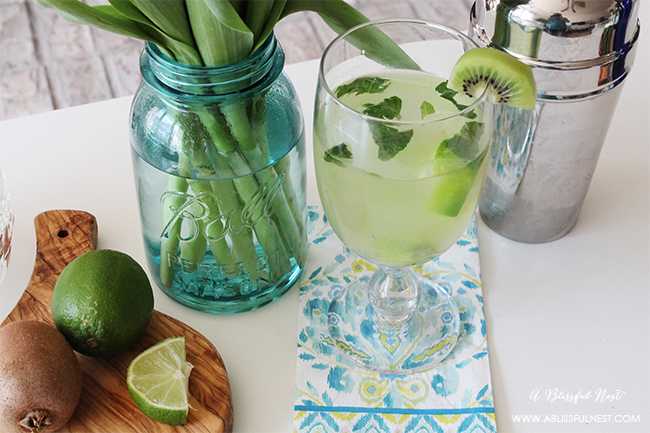 This delicious and refreshing cocktail recipe is perfect for your next gathering with friends. Entertain with this Vodka Kiwi Sour Cocktail Recipe for a unique twist for your dinner party. Recipe details on ablisfulnest.com