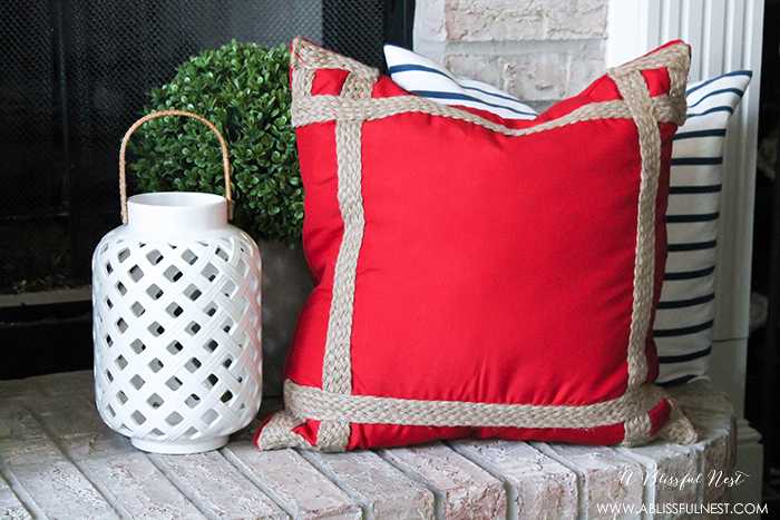 I adore the vintage Americana 4th of July mantle decor! With pops of aqua this is the perfect 4th of July decor by A Blissful Nest. https://ablisfulnest.com #4thofjuly #redwhiteandblue #4thofjulydecor