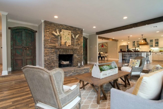 This living room feels so spacious and open - and I don't know if those doors lead anywhere but they're gorgeous! HGTV Fixer Upper Show, 20 Best Fixer Upper Rooms 
