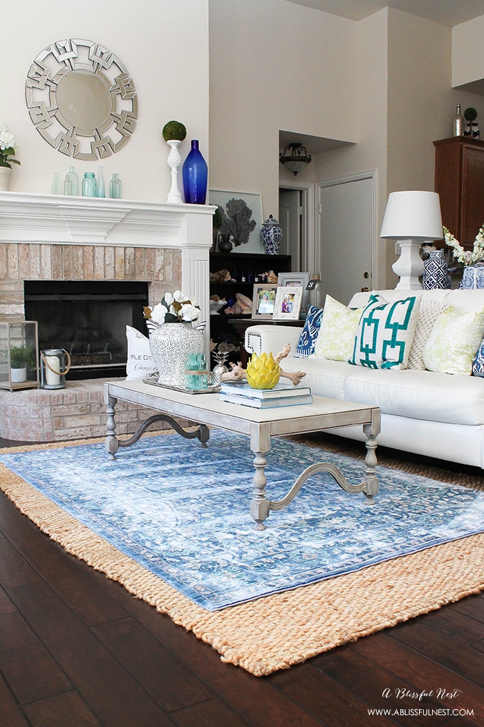 It’s time for a change! Show some designer flare and learn how to layer rugs like a pro. The designers all do it for a reason. It makes BIG impact. Make your room pop with these 5 simple tips from A Blissful Nest. https://ablisfulnest.com/ #rugideas #designtips #homedecortips #livingroom #livingroomideas 