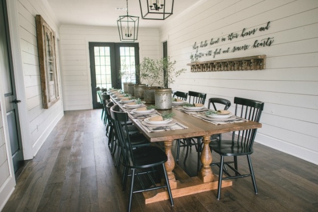 You can fit SO many people in this dining room! Love this farmhouse inspired buffet dining table. Magnolia Market The Barndominium, 20 Best Fixer Upper Rooms