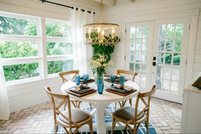 What's more welcoming than a bright breakfast nook bathing in natural light? Love the soft, natural look of this room. Magnolia Market The Beanstalk Bungalow, 20 Best Fixer Upper Rooms 