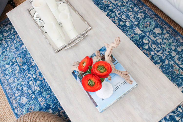 Check out these gorgeous coastal accents in this fall home tour with A Blissful Nest! Love the pops of orange in this home with its neutral pallet. See more at https://ablisfulnest.com/ #fallfrontporch #falldecorating #falldecor #fallhometour