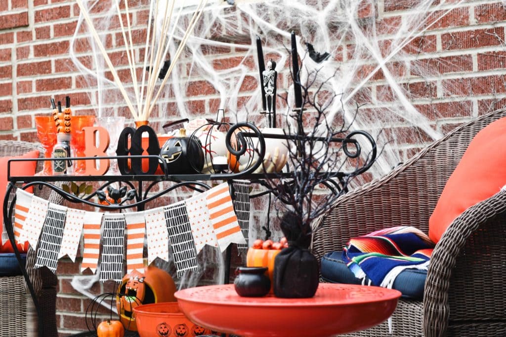 This Halloween Bar Cart isn't only for adults, this adorable cart is kid-friendly and oh so fun! Such a great way to celebrate this fun holiday! https://ablisfulnest.com/ #Halloween #Entertaining #HalloweenParty