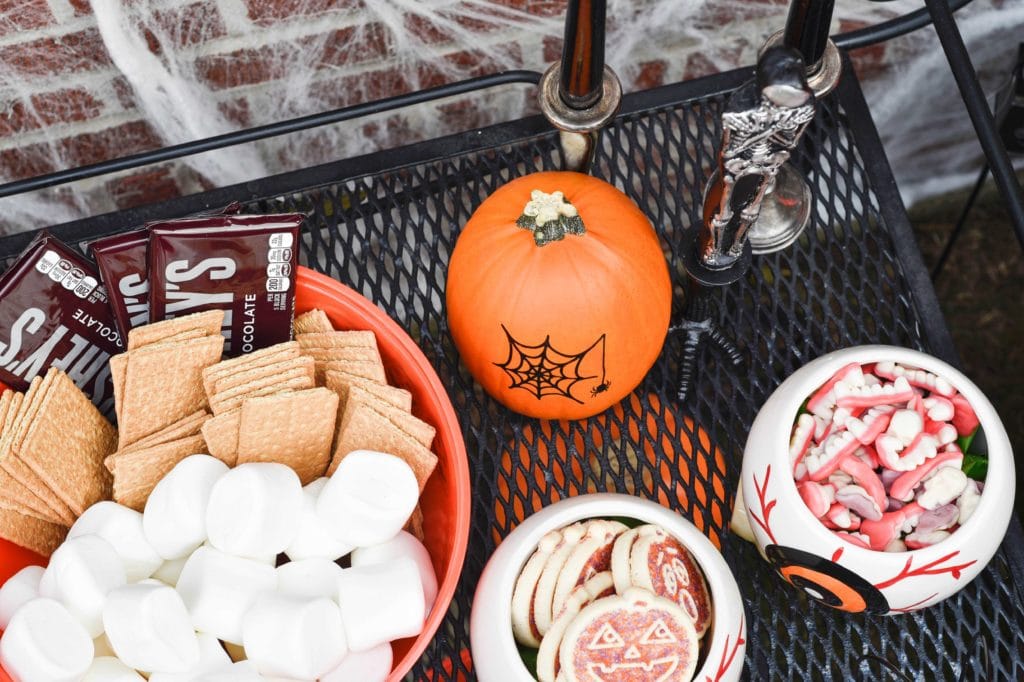 This Halloween Bar Cart isn't only for adults, this adorable cart is kid-friendly and oh so fun! Such a great way to celebrate this fun holiday! https://ablisfulnest.com/ #Halloween #Entertaining #HalloweenParty