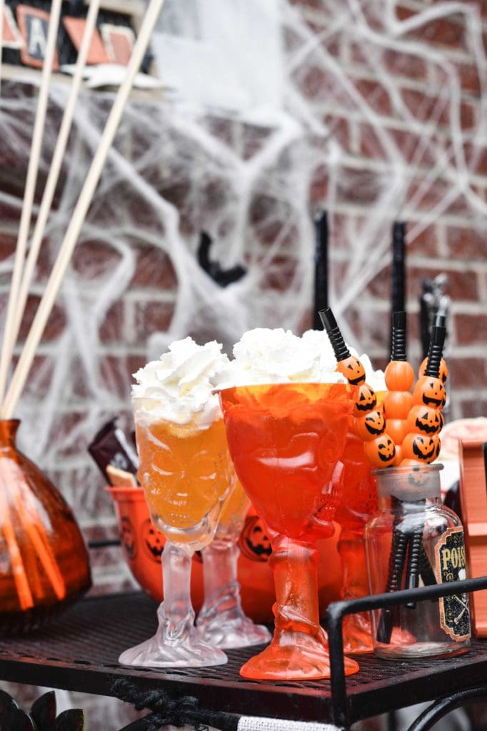 This Halloween Bar Cart isn't only for adults, this adorable cart is kid-friendly and oh so fun! Such a great way to celebrate this fun holiday! https://ablisfulnest.com/ #Halloween #Entertaining #HalloweenParty
