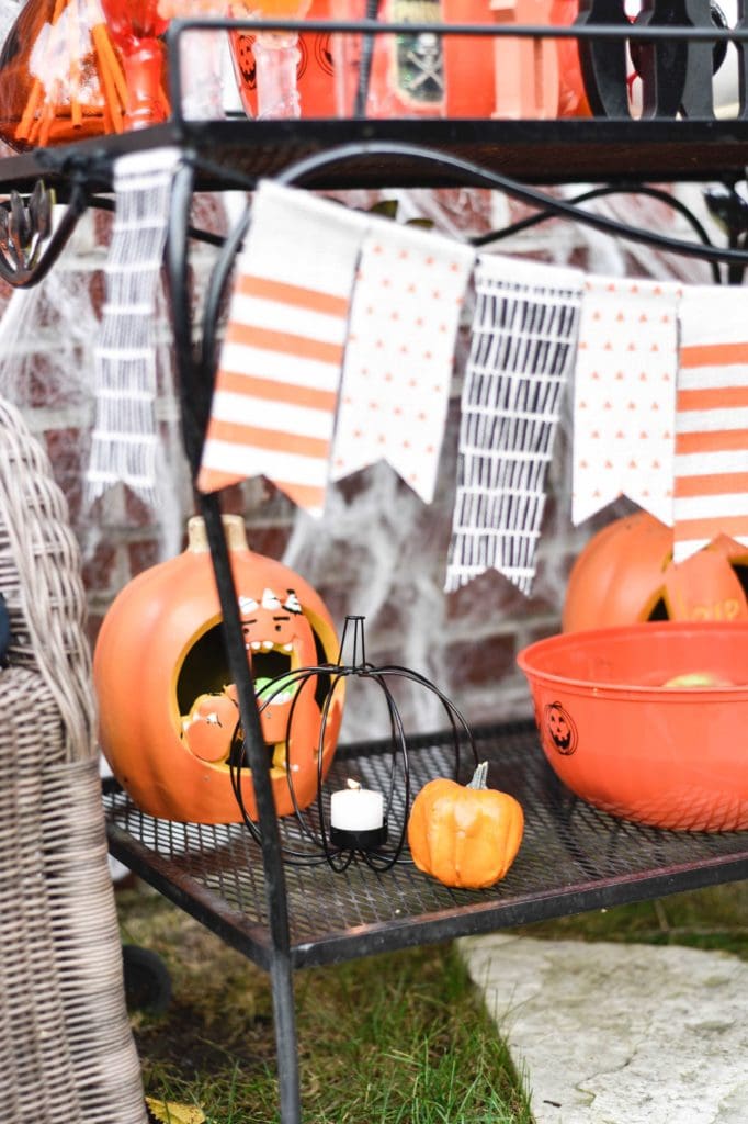 This Halloween Bar Cart isn't only for adults, this adorable cart is kid-friendly and oh so fun! Such a great way to celebrate this fun holiday! https://ablisfulnest.com/ #Halloween #Entertaining #HalloweenParty