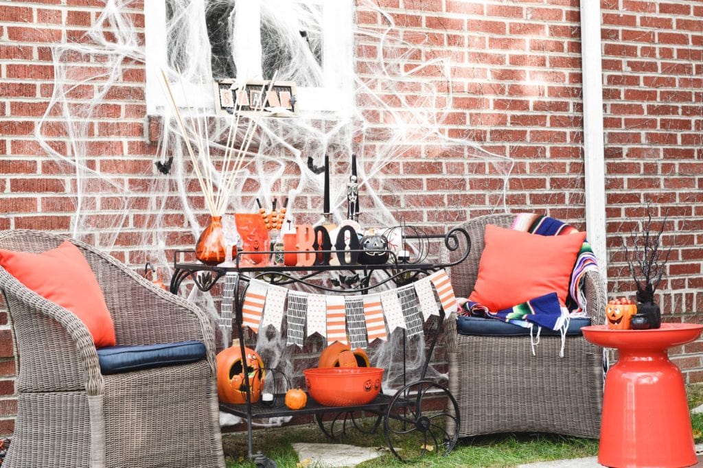This Halloween Bar Cart isn't only for adults, this adorable cart is kid-friendly and oh so fun! Such a great way to celebrate this fun holiday! https://ablisfulnest.com/ #Halloween #Entertaining #HalloweenParty