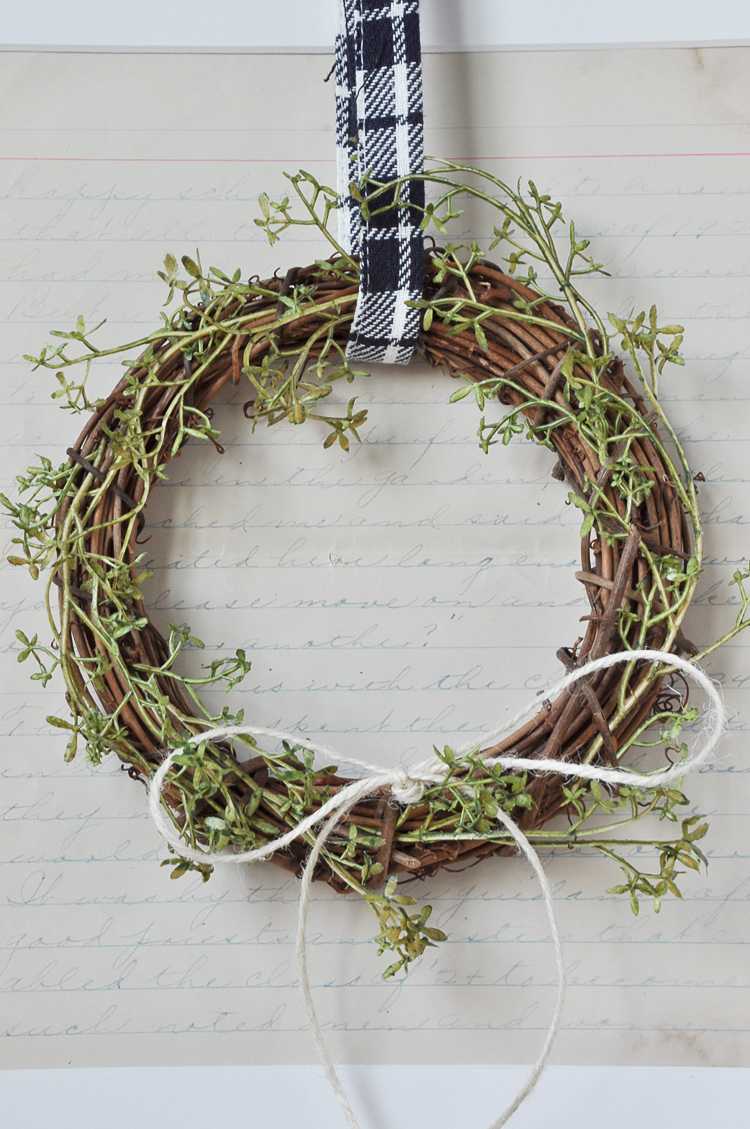 This fall farmhouse mini wreath is a quick and simple project to add a little fall beauty to your homes decor. See more at https://ablisfulnest.com #Fall #FarmhouseDecor #FallWreath