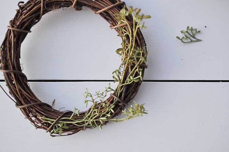 This fall farmhouse mini wreath is a quick and simple project to add a little fall beauty to your homes decor. See more at https://ablisfulnest.com #Fall #FarmhouseDecor #FallWreath