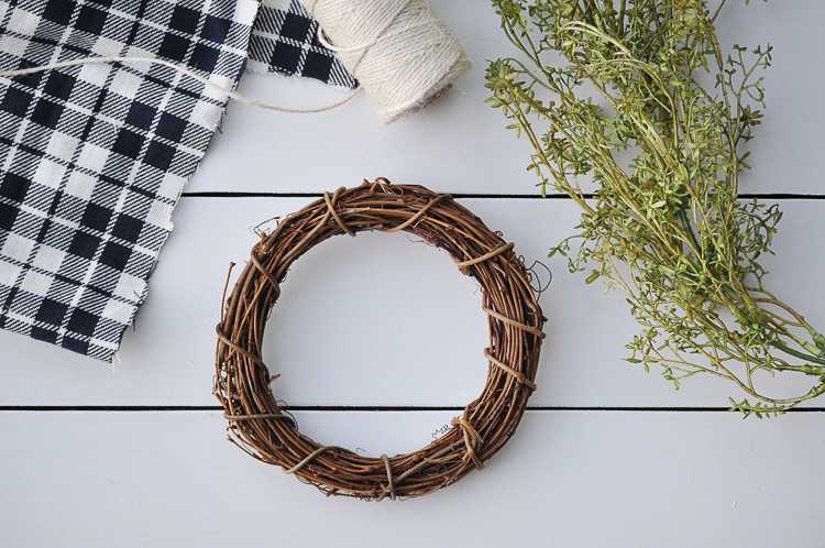 This fall farmhouse mini wreath is a quick and simple project to add a little fall beauty to your homes decor. See more at https://ablisfulnest.com #Fall #FarmhouseDecor #FallWreath
