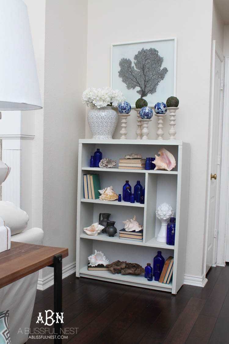 Got an old bookcase that needs to be updated? Checkout how this bookcase went from boring to fabulous with just a few easy steps! See more on https://ablisfulnest.com/ #bookcasemakeover #diybookcase #chalkfurniturepaint