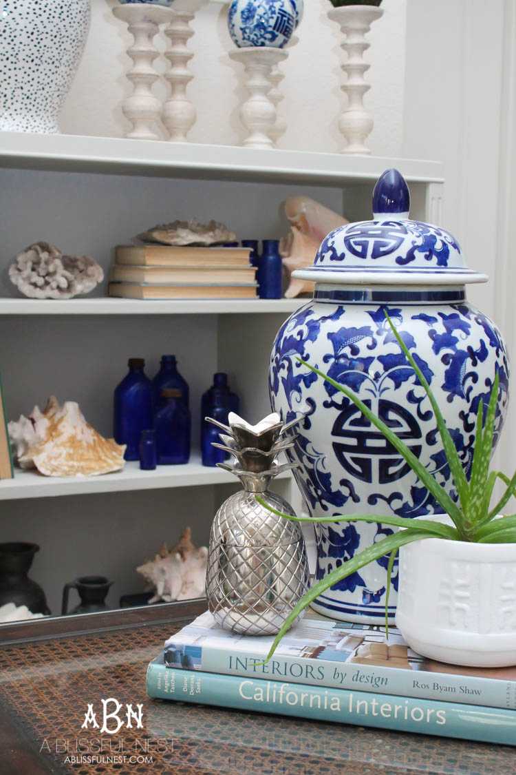 Got an old bookcase that needs to be updated? Checkout how this bookcase went from boring to fabulous with just a few easy steps! See more on https://ablisfulnest.com/ #bookcasemakeover #diybookcase #chalkfurniturepaint