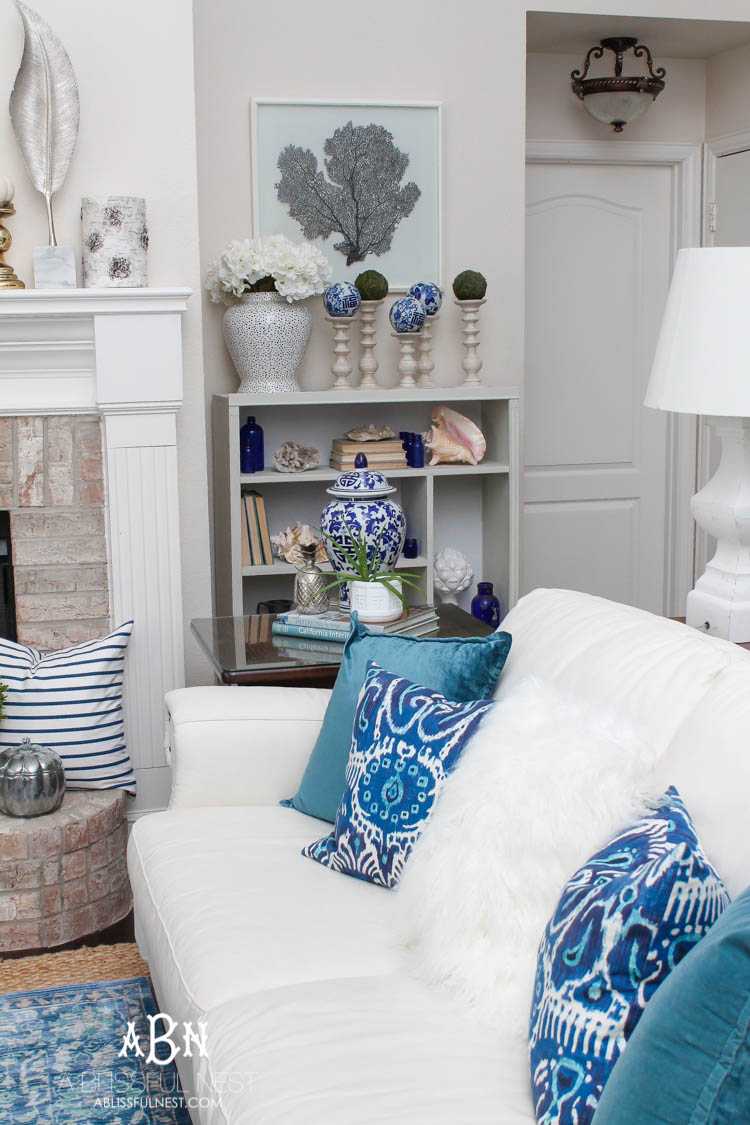 Got an old bookcase that needs to be updated? Checkout how this bookcase went from boring to fabulous with just a few easy steps! See more on https://ablisfulnest.com/ #bookcasemakeover #diybookcase #chalkfurniturepaint