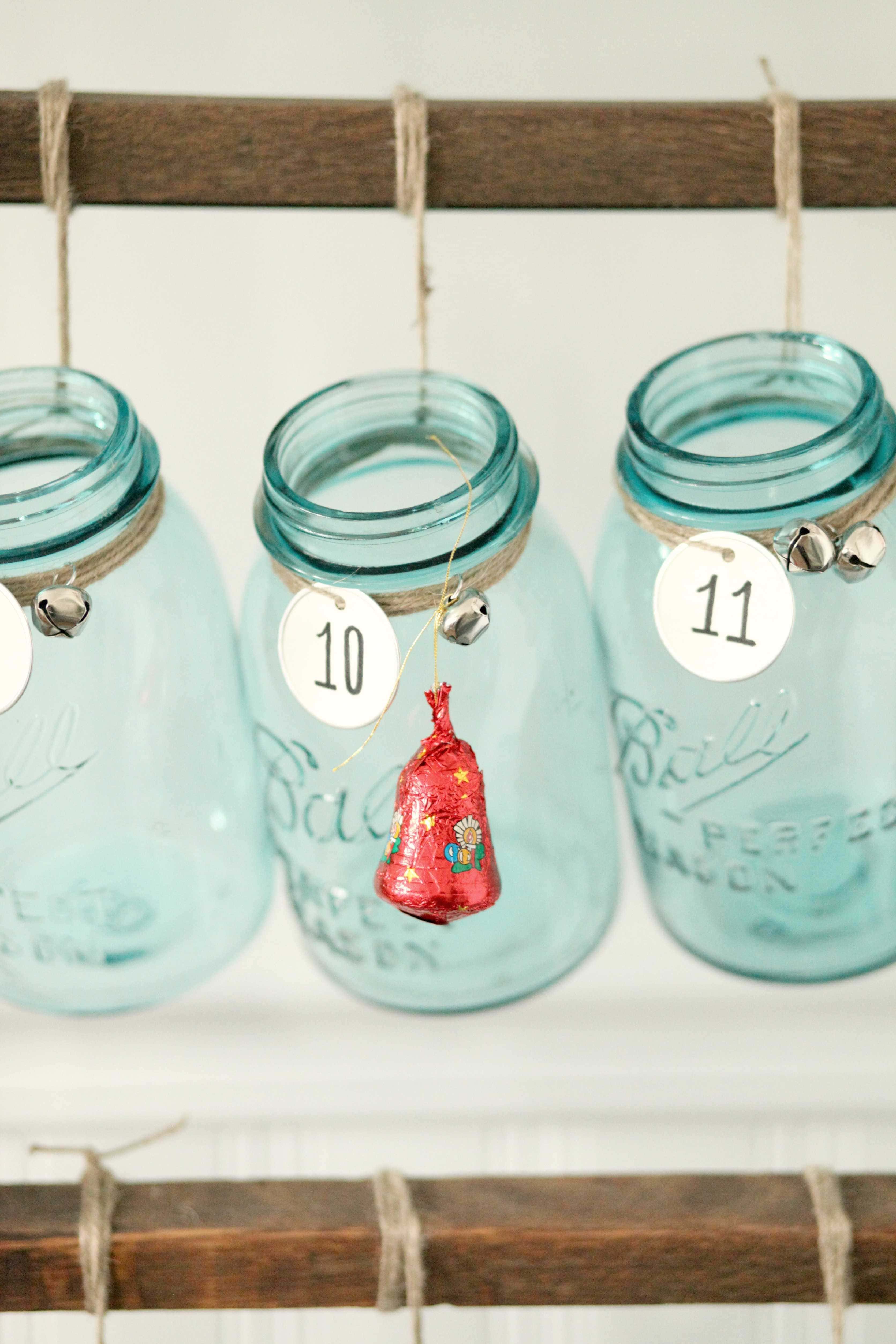 Beautiful Christmas decor using a Vintage Ladder for a Mason Jar Advent Calendar. So festive and fun! See more on https://ablisfulnest.com/ #Christmas #Advent #ChristmasDecor