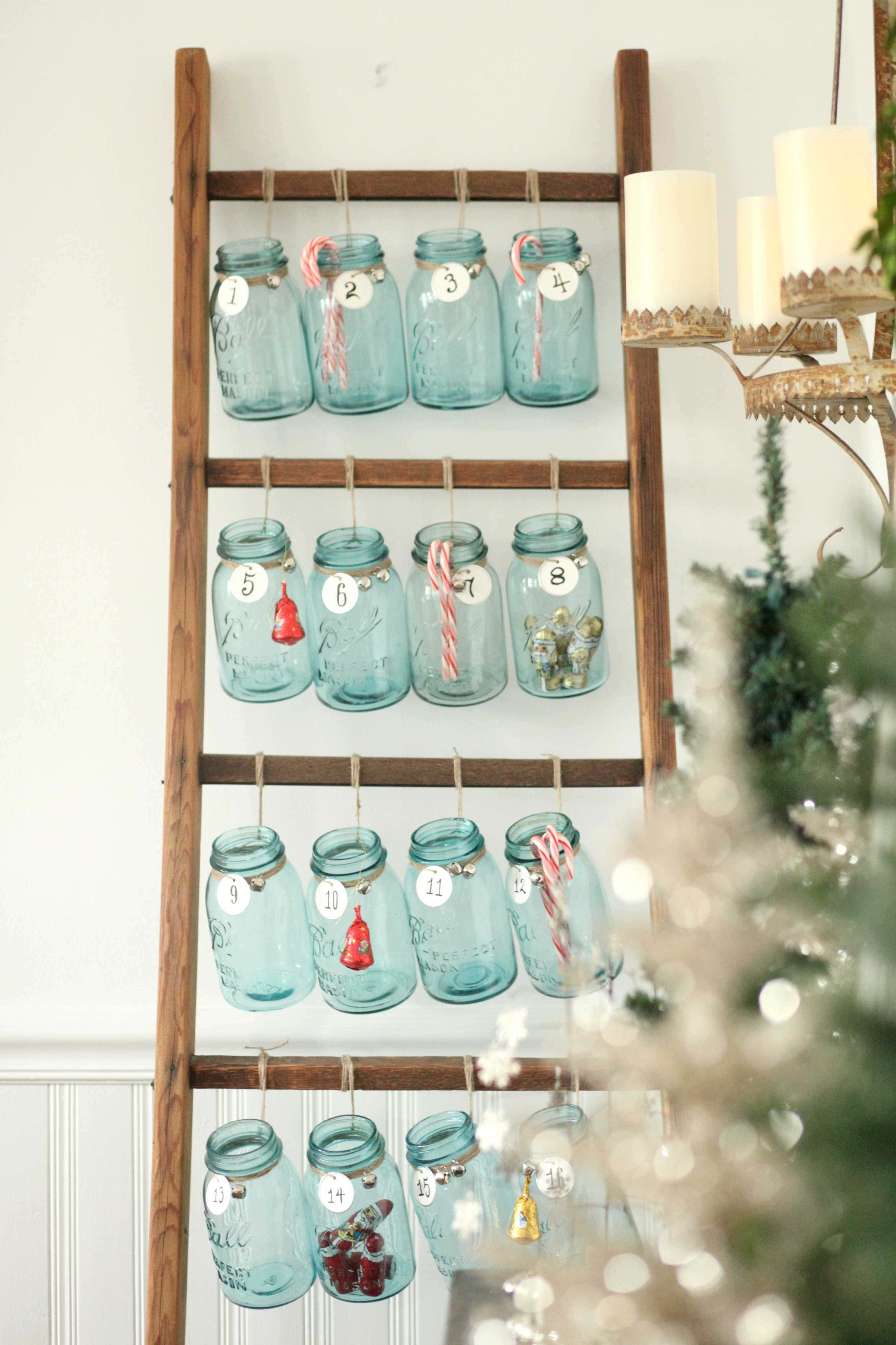 Beautiful Christmas decor using a Vintage Ladder for a Mason Jar Advent Calendar. So festive and fun! See more on https://ablisfulnest.com/ #Christmas #Advent #ChristmasDecor