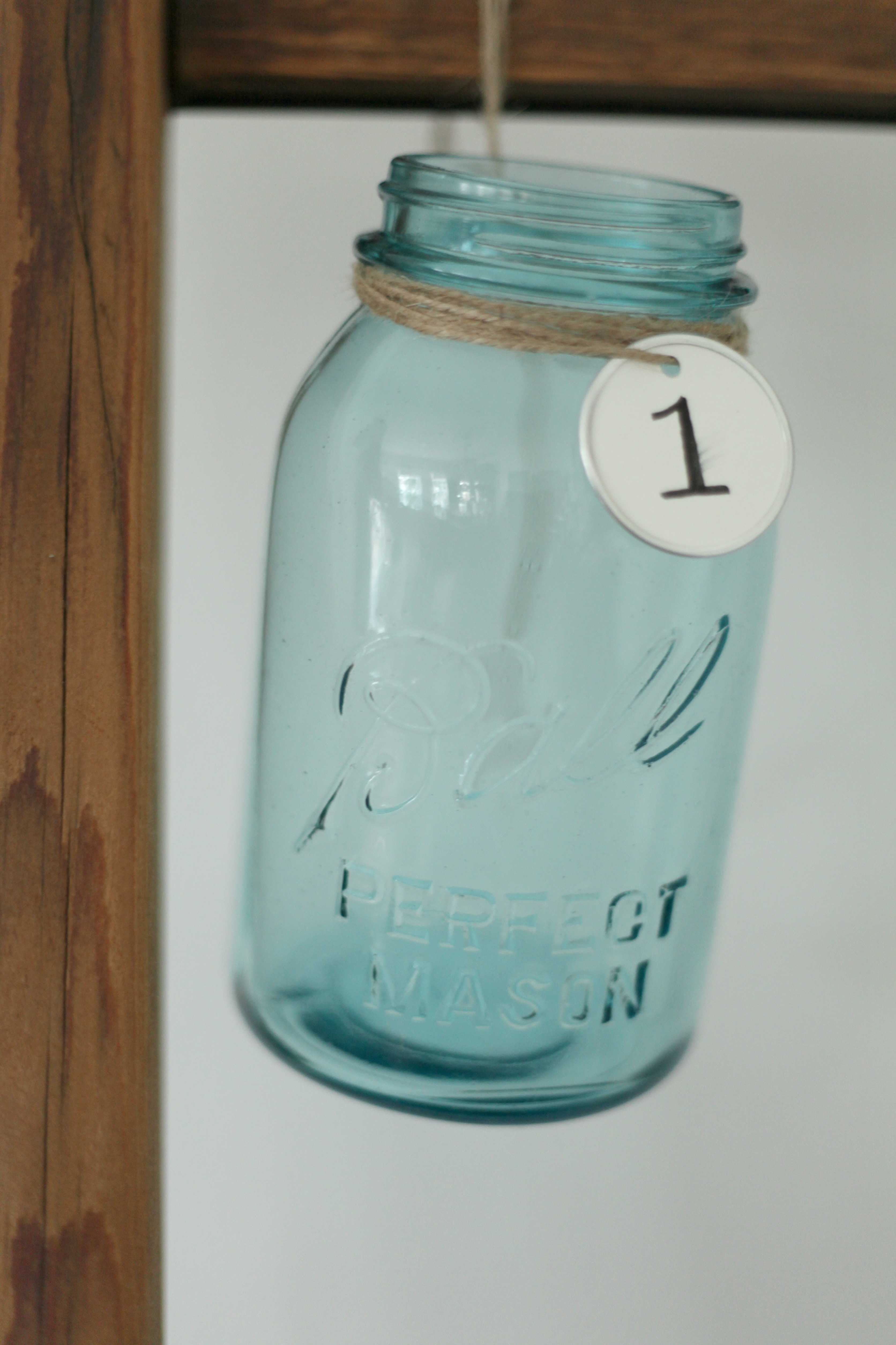 Beautiful Christmas decor using a Vintage Ladder for a Mason Jar Advent Calendar. So festive and fun! See more on https://ablisfulnest.com/ #Christmas #Advent #ChristmasDecor
