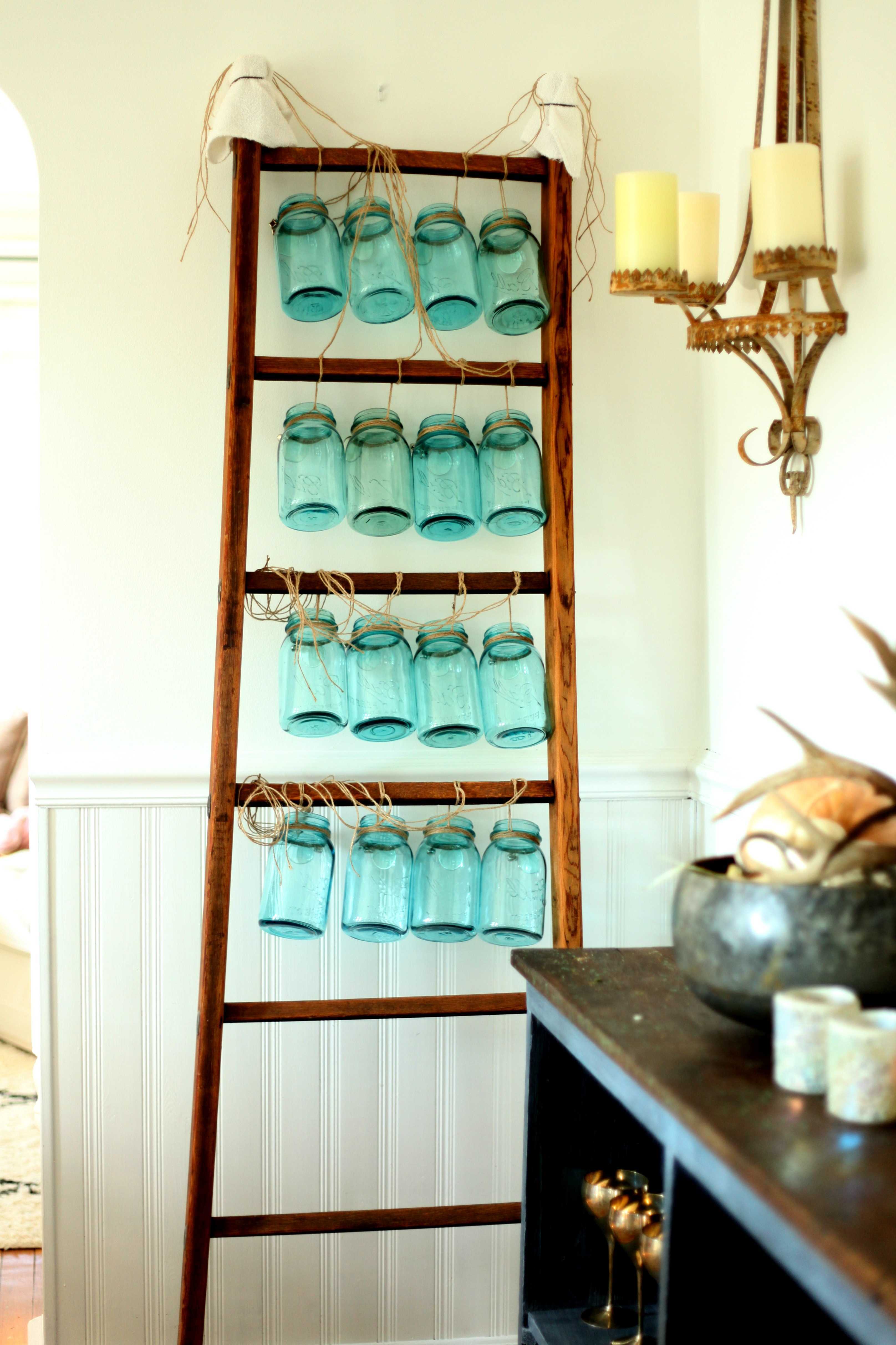 Beautiful Christmas decor using a Vintage Ladder for a Mason Jar Advent Calendar. So festive and fun! See more on https://ablisfulnest.com/ #Christmas #Advent #ChristmasDecor