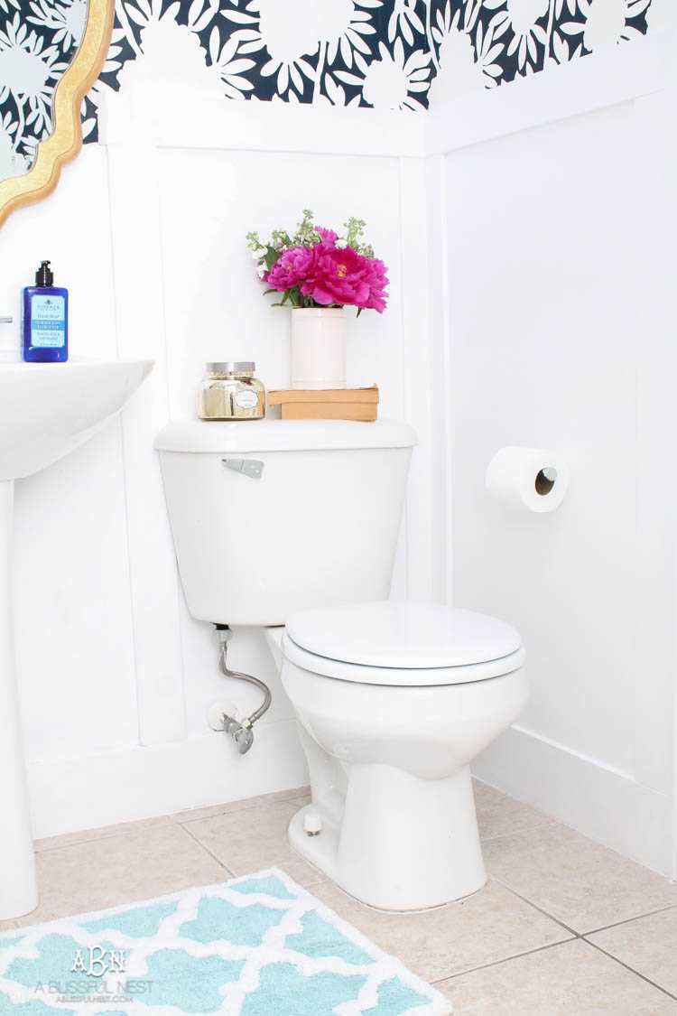 This is such a huge transformation on this bathroom with not many updates. Checkout how with a few simple changes you can get a wow factor bathroom remodel. See more on https://ablisfulnest.com/ #bathroomremodel #bathroommakeover #ad #deltafaucet