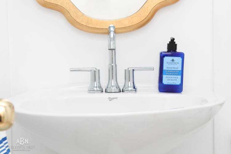This is such a huge transformation on this bathroom with not many updates. Checkout how with a few simple changes you can get a wow factor bathroom remodel. See more on https://ablisfulnest.com/ #bathroomremodel #bathroommakeover #ad #deltafaucet
