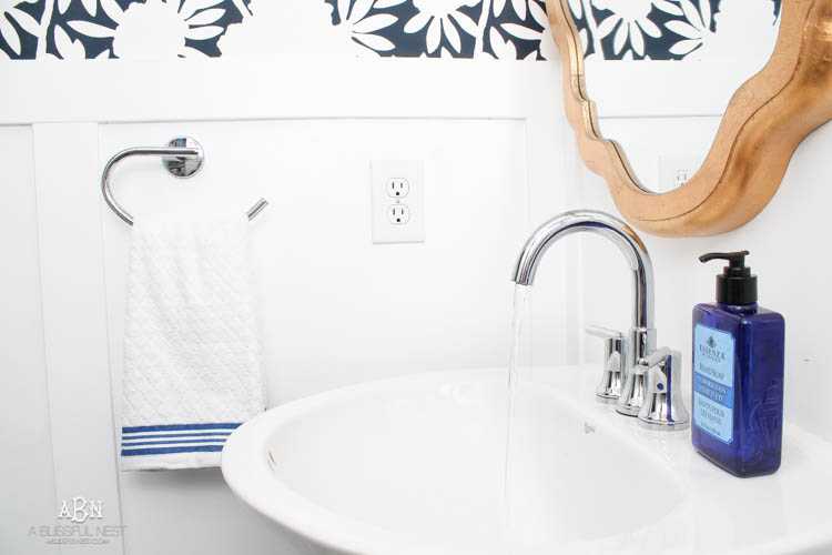 This is such a huge transformation on this bathroom with not many updates. Checkout how with a few simple changes you can get a wow factor bathroom remodel. See more on https://ablisfulnest.com/ #bathroomremodel #bathroommakeover #ad #deltafaucet