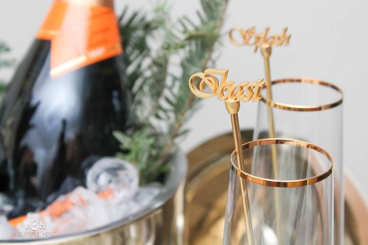 These are such great ideas to transition your Christmas décor into celebrating New Years Eve! Love all the gold and sparkly accents! See more on https://ablisfulnest.com/ #newyearseve #newyearsbarcart #ad #Pier1Love