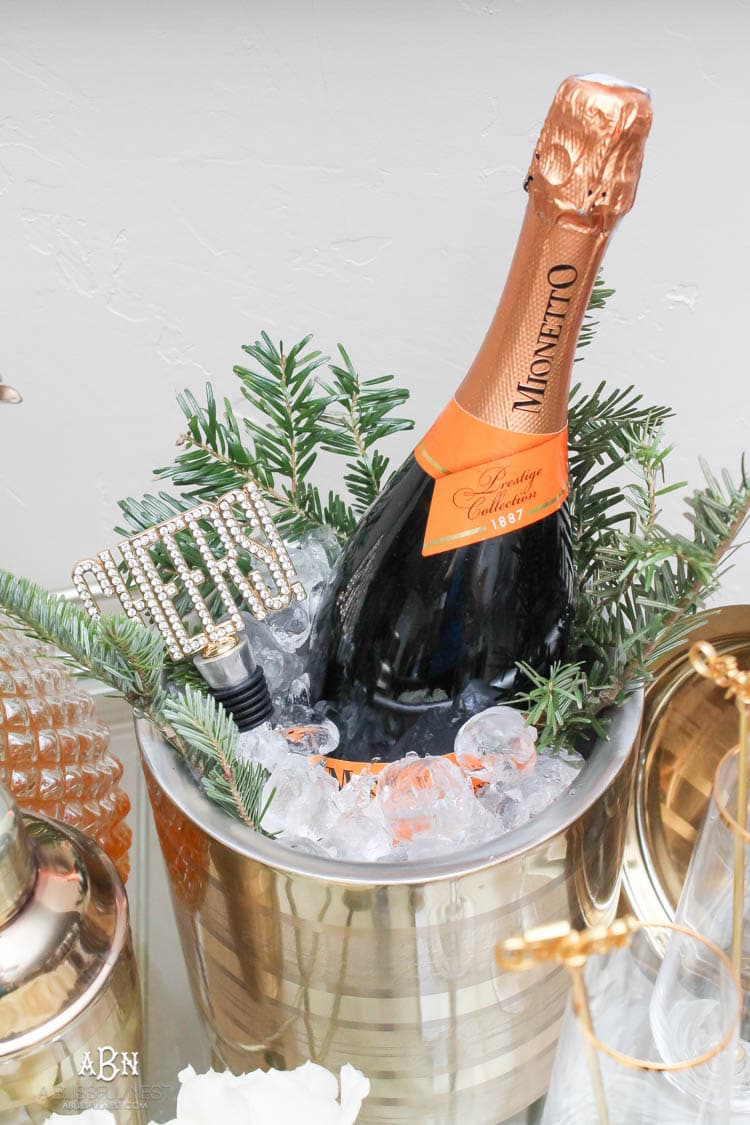 These are such great ideas to transition your Christmas décor into celebrating New Years Eve! Love all the gold and sparkly accents! See more on https://ablisfulnest.com/ #newyearseve #newyearsbarcart #ad #Pier1Love
