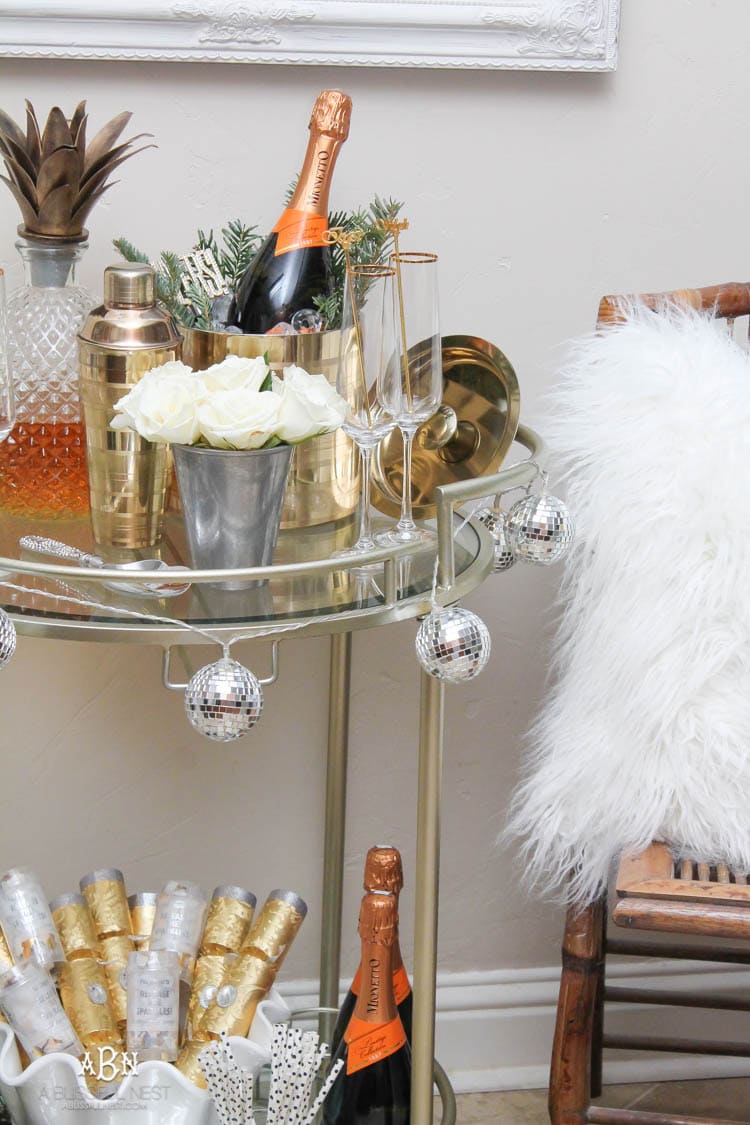 These are such great ideas to transition your Christmas décor into celebrating New Years Eve! Love all the gold and sparkly accents! See more on https://ablisfulnest.com/ #newyearseve #newyearsbarcart #ad #Pier1Love
