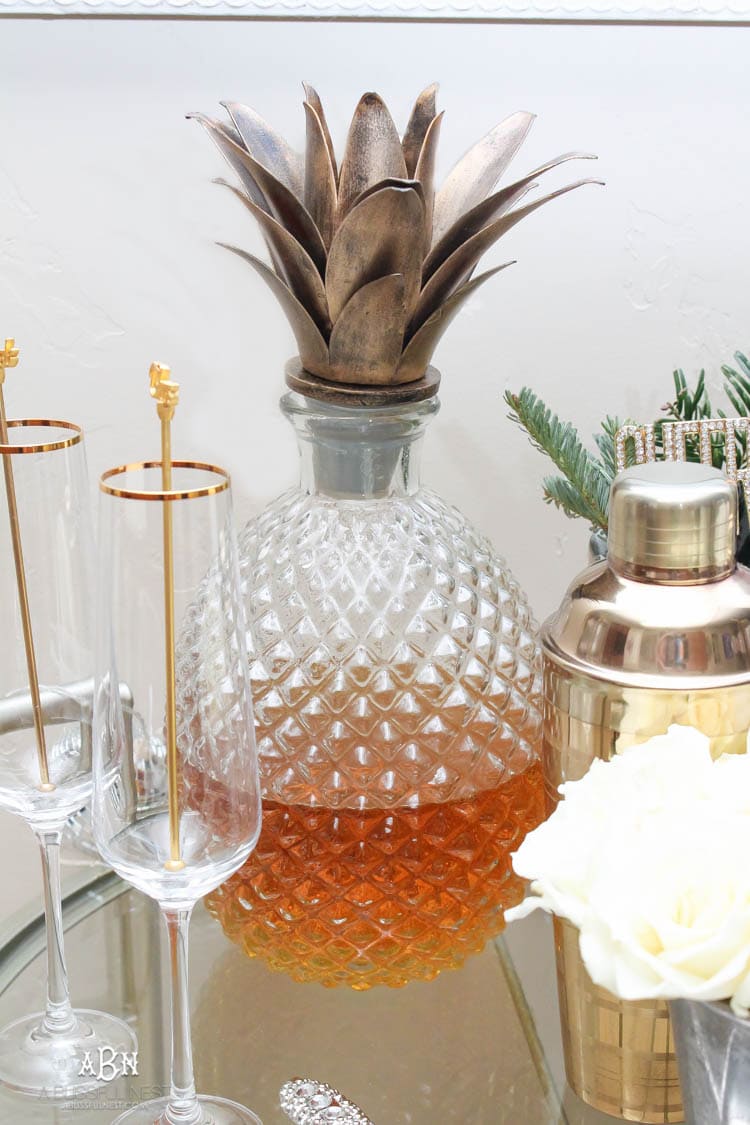 These are such great ideas to transition your Christmas décor into celebrating New Years Eve! Love all the gold and sparkly accents! See more on https://ablisfulnest.com/ #newyearseve #newyearsbarcart #ad #Pier1Love
