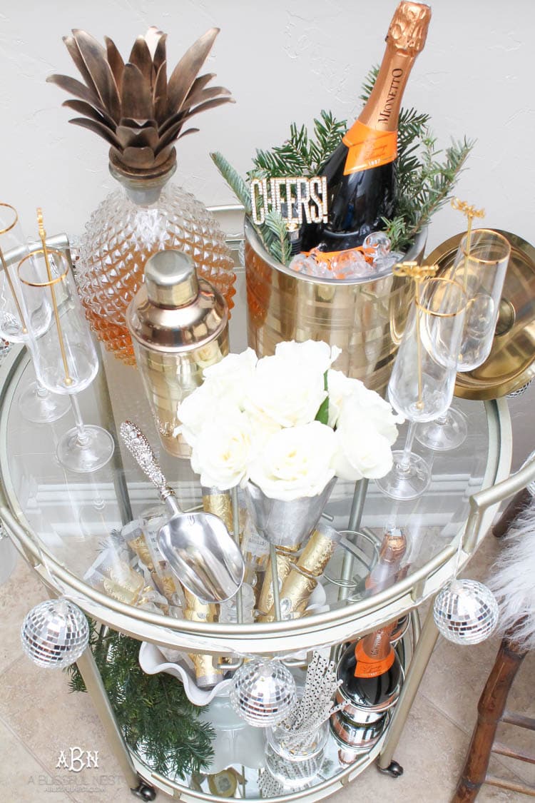 These are such great ideas to transition your Christmas décor into celebrating New Years Eve! Love all the gold and sparkly accents! See more on https://ablisfulnest.com/ #newyearseve #newyearsbarcart #ad #Pier1Love