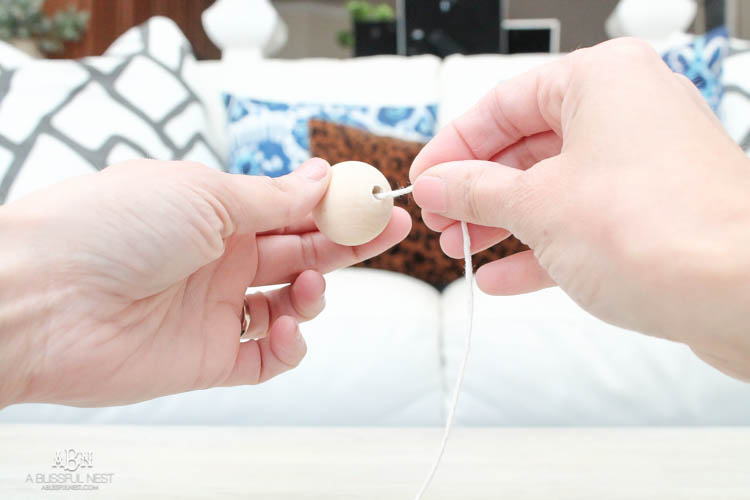 I can not believe how expensive prayer beads normally are! This DIY farmhouse wood prayer beads tutorial is so easy to make and only cost . What an amazing and easy DIY Farmhouse decor project! See more on https://ablisfulnest.com/ #farmhousedecor #farmhousestyle