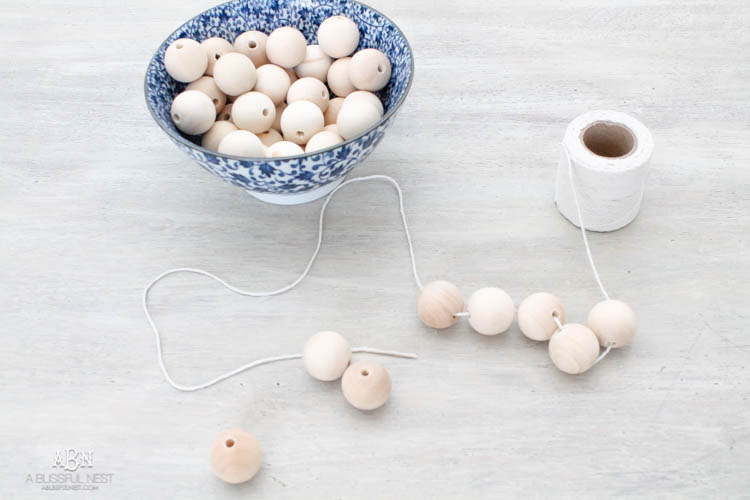 I can not believe how expensive prayer beads normally are! This DIY farmhouse wood prayer beads tutorial is so easy to make and only cost . What an amazing and easy DIY Farmhouse decor project! See more on https://ablisfulnest.com/ #farmhousedecor #farmhousestyle