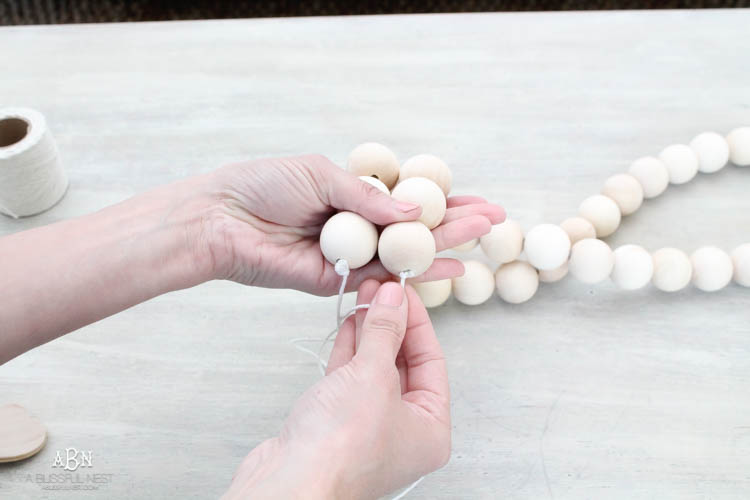 I can not believe how expensive prayer beads normally are! This DIY farmhouse wood prayer beads tutorial is so easy to make and only cost . What an amazing and easy DIY Farmhouse decor project! See more on https://ablisfulnest.com/ #farmhousedecor #farmhousestyle