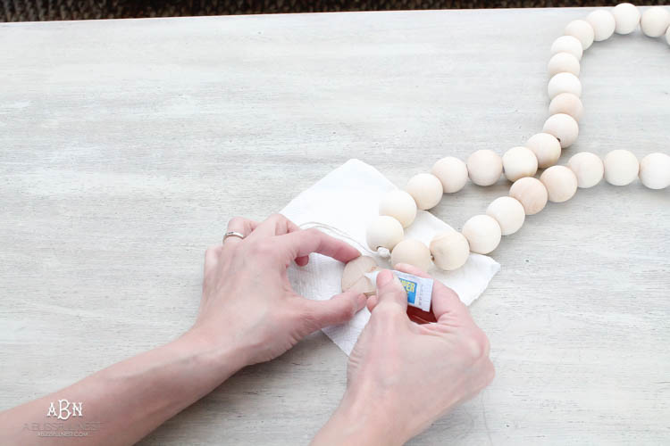 I can not believe how expensive prayer beads normally are! This DIY farmhouse wood prayer beads tutorial is so easy to make and only cost . What an amazing and easy DIY Farmhouse decor project! See more on https://ablisfulnest.com/ #farmhousedecor #farmhousestyle