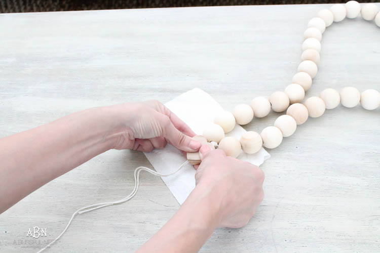 I can not believe how expensive prayer beads normally are! This DIY farmhouse wood prayer beads tutorial is so easy to make and only cost . What an amazing and easy DIY Farmhouse decor project! See more on https://ablisfulnest.com/ #farmhousedecor #farmhousestyle