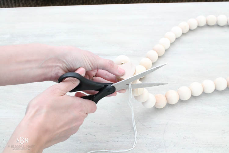 I can not believe how expensive prayer beads normally are! This DIY farmhouse wood prayer beads tutorial is so easy to make and only cost . What an amazing and easy DIY Farmhouse decor project! See more on https://ablisfulnest.com/ #farmhousedecor #farmhousestyle