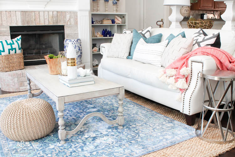 It's time to redecorate for spring! Love this fresh and inviting spring living room! See more on https://ablisfulnest.com/ #springdecorating #livingroom