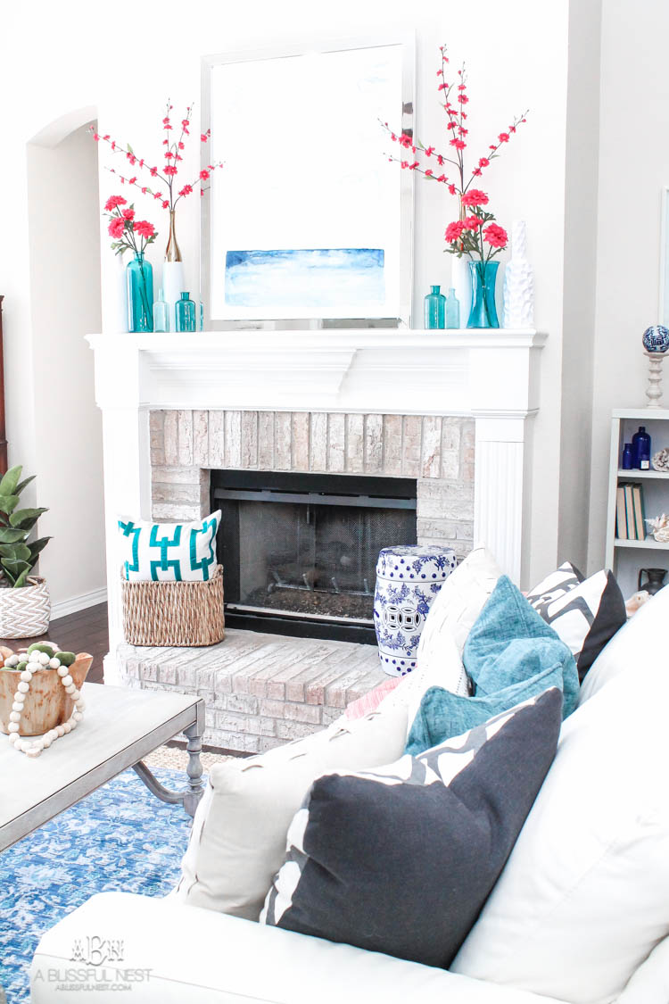 It's time to redecorate for spring! Love this fresh and inviting spring living room! See more on https://ablisfulnest.com/ #springdecorating #livingroom