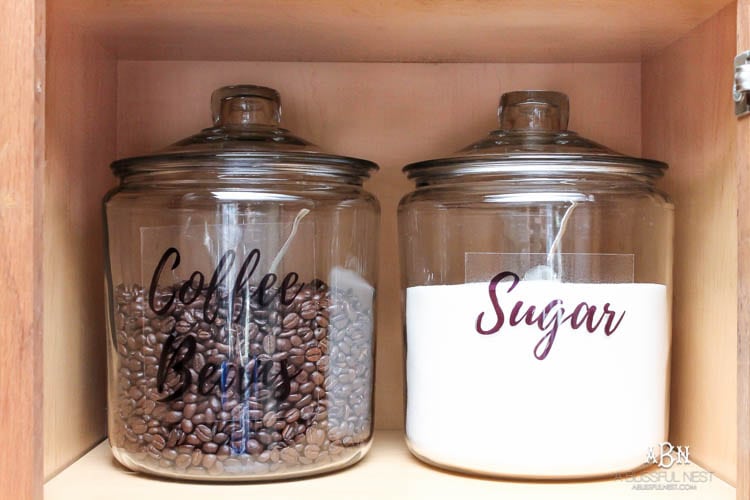 This is such a great idea! Transform a dead cabinet space with these coffee cabinet organization ideas! See more on https://ablisfulnest.com/ #coffee #coffeestation