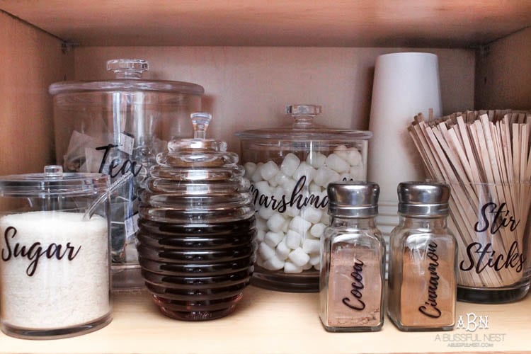 This is such a great idea! Transform a dead cabinet space with these coffee cabinet organization ideas! See more on https://ablisfulnest.com/ #coffee #coffeestation