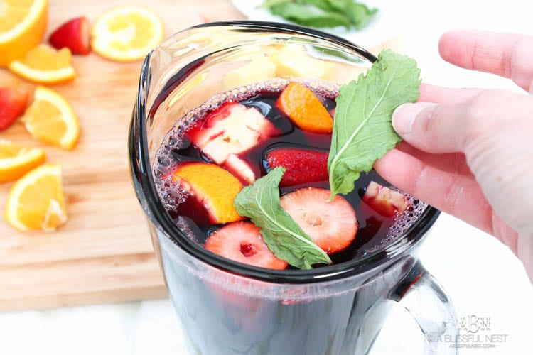 This is such a delicious sangria drink recipe celebrating Girl's Night In and the release of Fifty Shades Darker movie on dvd! See more on https://ablisfulnest.com/ #ad #drinkrecipe #FiftyShadesDarker