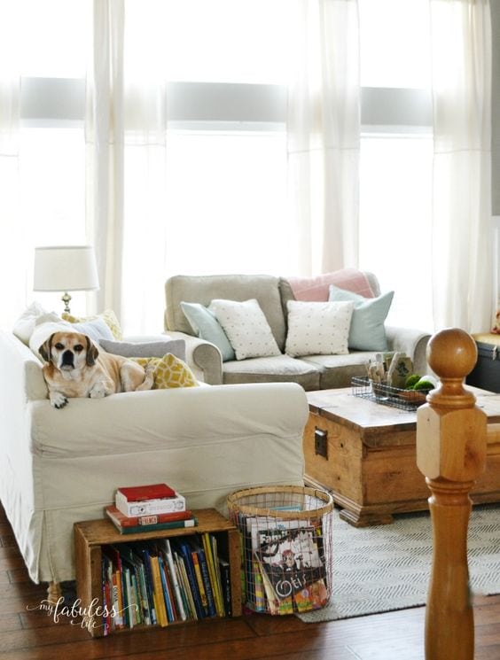 Create a family friendly living room that is still stylish yet kid friendly, head over to https://ablisfulnest.com/ for all the tips! #interiors #livingrooms #kidspaces