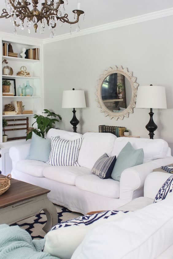 Create a family friendly living room that is still stylish yet kid friendly, head over to https://ablisfulnest.com/ for all the tips! #interiors #livingrooms #kidspaces