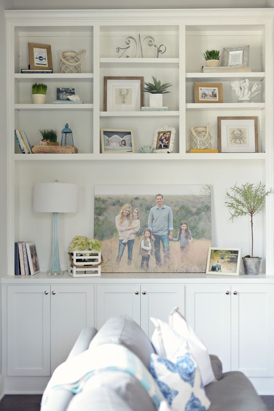 Create a family friendly living room that is still stylish yet kid friendly, head over to https://ablisfulnest.com/ for all the tips! #interiors #livingrooms #kidspaces