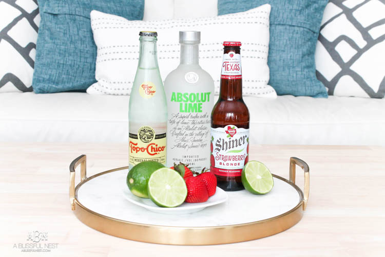 This is such a delicious beer cocktail recipe! Love the mix of strawberries and lime. See more on https://ablisfulnest.com/ #ad #totalwine #cocktailrecipe