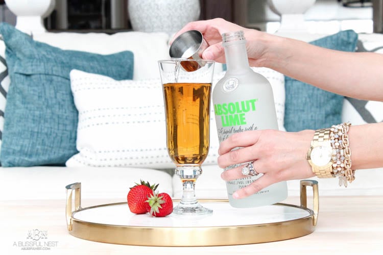 This is such a delicious beer cocktail recipe! Love the mix of strawberries and lime. See more on https://ablisfulnest.com/ #ad #totalwine #cocktailrecipe
